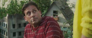 Movie still from “Welcome to Marwen” (2018), directed by Robert Zemeckis – A person wearing a red and white striped shirt; Close Up shot, Low angle