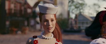 Movie still from “Welcome to Marwen” (2018), directed by Robert Zemeckis – A doll with a hat and a pearl necklace; Close Up shot, Over the shoulder angle
