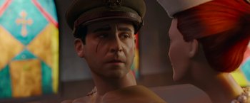 Movie still from “Welcome to Marwen” (2018), directed by Robert Zemeckis – The face of a man in a military uniform; Close Up shot, Over the shoulder angle