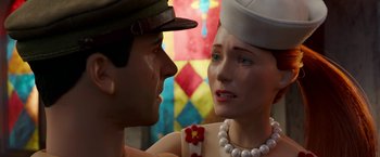 Movie still from “Welcome to Marwen” (2018), directed by Robert Zemeckis – A man and a woman face to face in front of a stained glass window; Close Up shot, Over the shoulder angle