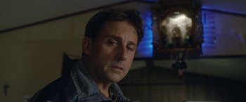 Movie still from “Welcome to Marwen” (2018), directed by Robert Zemeckis – A person wearing a jean jacket; Close Up shot, Low angle