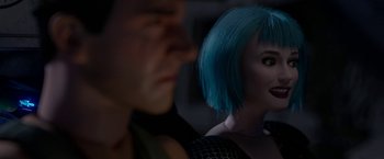 Movie still from “Welcome to Marwen” (2018), directed by Robert Zemeckis – A man and a woman with blue hair looking at each other; Close Up shot, Over the shoulder angle