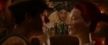 Movie still from “Welcome to Marwen” (2018), directed by Robert Zemeckis – A man and a woman looking in a mirror; Medium shot, Over the shoulder angle