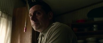 Movie still from “Welcome to Marwen” (2018), directed by Robert Zemeckis – A person wearing a hat; Close Up shot, Low angle