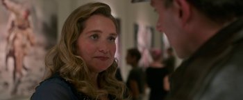 Movie still from “Welcome to Marwen” (2018), directed by Robert Zemeckis – A person with long blonde hair; Close Up shot, Over the shoulder angle