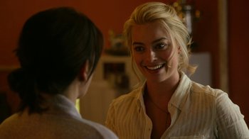 Movie still from “Whiskey Tango Foxtrot” (2016), directed by Glenn Ficarra – Two women are talking to each other in a room; Close Up shot, Over the shoulder angle