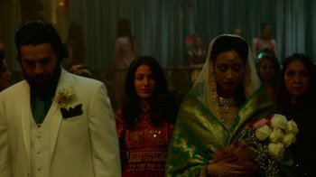 Movie still from “Whiskey Tango Foxtrot” (2016), directed by Glenn Ficarra – A couple of women standing next to each other; Medium shot, Over the shoulder angle