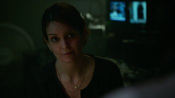 Movie still from “Whiskey Tango Foxtrot” (2016), directed by Glenn Ficarra – A person wearing a necklace; Close Up shot, Over the shoulder angle