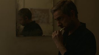 Movie still from “Whiskey Tango Foxtrot” (2016), directed by Glenn Ficarra – A man brushing his teeth in front of a bathroom mirror; Close Up shot, Over the shoulder angle