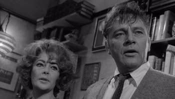 Movie still from “Who's Afraid of Virginia Woolf?” (1966), directed by Mike Nichols – An older man and a younger woman in a black and white photo; Close Up shot, Low angle