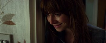 Movie still from “Wild Rose” (2018), directed by Tom Harper – A person looking out of a window; Close Up shot, Over the shoulder angle