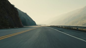 Movie still from “Wild Tales” (2014), directed by Damián Szifron – A highway with a mountain in the background; Extreme Wide shot, Low angle