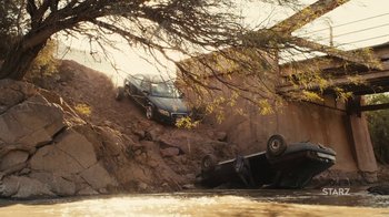 Movie still from “Wild Tales” (2014), directed by Damián Szifron – A car that is sitting on top of a hill; Extreme Wide shot, High angle