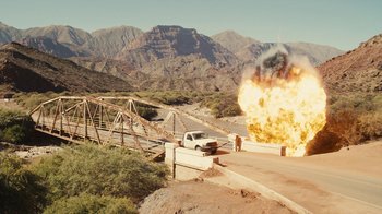 Movie still from “Wild Tales” (2014), directed by Damián Szifron – A car that is sitting in the dirt; Extreme Wide shot, High angle