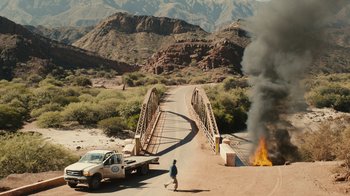 Movie still from “Wild Tales” (2014), directed by Damián Szifron – A man walking across a bridge near a fire; Extreme Wide shot, Over the shoulder angle