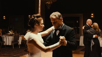 Movie still from “Wild Tales” (2014), directed by Damián Szifron – A man and a woman are dancing together in formal wear; Medium shot, Low angle