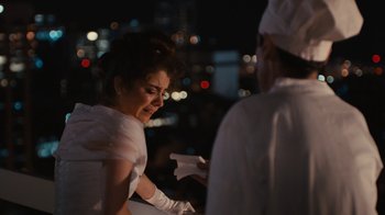 Movie still from “Wild Tales” (2014), directed by Damián Szifron – A woman in a white dress and a man in a white suit; Medium shot, Over the shoulder angle