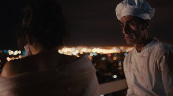 Movie still from “Wild Tales” (2014), directed by Damián Szifron – A man in a chef's hat and a woman in an apron; Close Up shot, Over the shoulder angle
