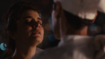 Movie still from “Wild Tales” (2014), directed by Damián Szifron – A young woman is getting her face painted; Close Up shot, Over the shoulder angle
