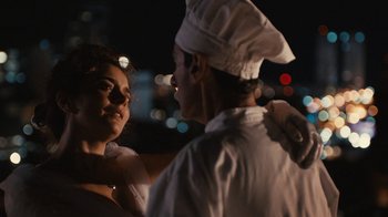 Movie still from “Wild Tales” (2014), directed by Damián Szifron – A man and a woman are dressed in chef's hats; Close Up shot, Over the shoulder angle