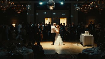 Movie still from “Wild Tales” (2014), directed by Damián Szifron – A man and a woman are dancing on the dance floor; Wide shot, High angle