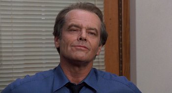 Movie still from “Wolf” (1994), directed by Mike Nichols – A person wearing a shirt and a tie; Close Up shot, Low angle