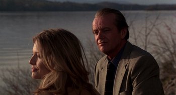 Movie still from “Wolf” (1994), directed by Mike Nichols – A man and a woman are looking at one another; Close Up shot, Over the shoulder angle