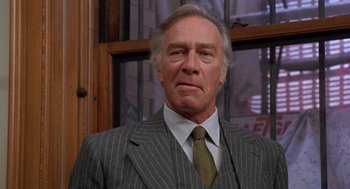Movie still from “Wolf” (1994), directed by Mike Nichols – An older man in a suit and a tie; Close Up shot, Low angle