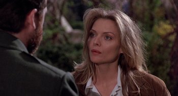 Movie still from “Wolf” (1994), directed by Mike Nichols – A person talking to another person; Close Up shot, Over the shoulder angle