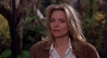 Movie still from “Wolf” (1994), directed by Mike Nichols – A person with long hair; Close Up shot, Over the shoulder angle