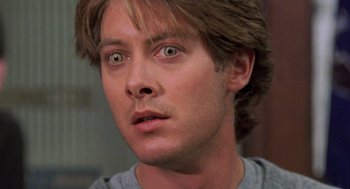 Movie still from “Wolf” (1994), directed by Mike Nichols – A person looking at the camera; Close Up shot, Over the shoulder angle