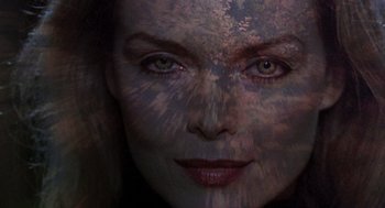 Movie still from “Wolf” (1994), directed by Mike Nichols – The face of a woman; Close Up shot, Overhead angle