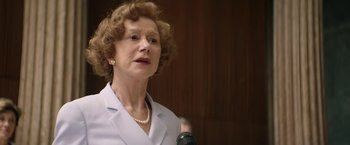 Movie still from “Woman in Gold” (2015), directed by Simon Curtis – An older woman is speaking into a microphone; Close Up shot, Low angle