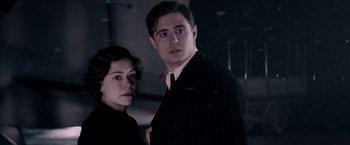 Movie still from “Woman in Gold” (2015), directed by Simon Curtis – A man and a woman standing next to each other; Medium shot, Low angle