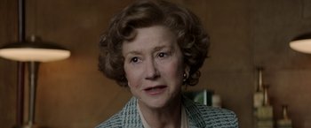 Movie still from “Woman in Gold” (2015), directed by Simon Curtis – An older woman wearing a jacket and earrings; Close Up shot, Over the shoulder angle