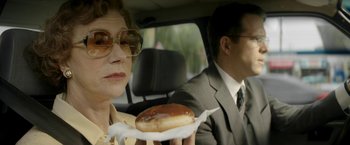 Movie still from “Woman in Gold” (2015), directed by Simon Curtis – A man and a woman sitting in the back seat of a car; Close Up shot, Over the shoulder angle