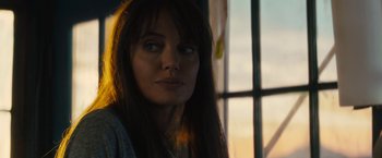 Movie still from “Wrong Turn” (2021), directed by Mike P. Nelson – A person with long brown hair; Close Up shot, Over the shoulder angle