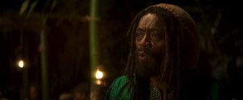 Movie still from “Yardie” (2018), directed by Idris Elba – A person with dreadlocks; Close Up shot, Low angle