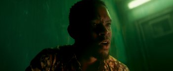 Movie still from “Yardie” (2018), directed by Idris Elba – A person with a beard; Close Up shot, Low angle