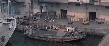 Movie still from “You Only Live Twice” (1967), directed by Lewis Gilbert – A group of men standing on top of a boat; Extreme Wide shot, High angle