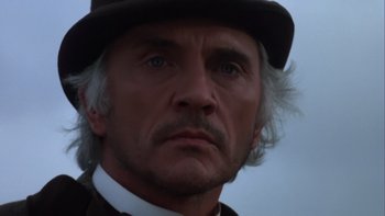 Movie still from “Young Guns” (1988), directed by Christopher Cain – A person wearing a hat; Close Up shot, Low angle