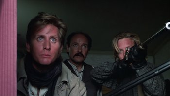 Movie still from “Young Guns” (1988), directed by Christopher Cain – A group of men standing next to each other; Close Up shot, Low angle