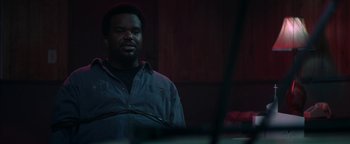 Movie still from “Zeroville” (2019), directed by James Franco – A man standing in front of a microphone; Close Up shot, Over the shoulder angle