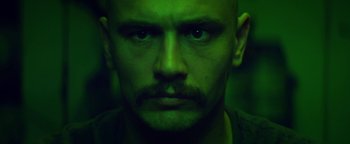 Movie still from “Zeroville” (2019), directed by James Franco – A person with a mustache; Close Up shot, Low angle
