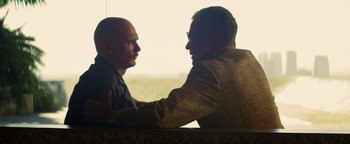 Movie still from “Zeroville” (2019), directed by James Franco – A man and a man sitting next to each other; Close Up shot, Over the shoulder angle