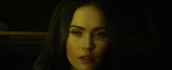 Movie still from “Zeroville” (2019), directed by James Franco – A woman's face in the dark; Close Up shot, Low angle