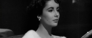 Movie still from “Zeroville” (2019), directed by James Franco – A black - and - white photo of a woman in a white dress; Close Up shot, Low angle