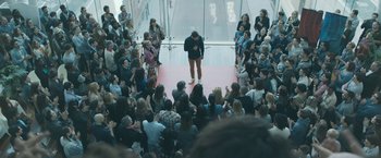 Movie still from “Zoe” (2018), directed by Drake Doremus – A crowd of people gathered around a man on a red carpet; Extreme Wide shot, High angle