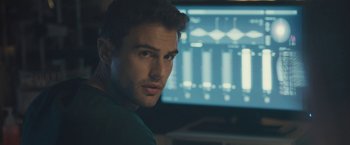 Movie still from “Zoe” (2018), directed by Drake Doremus – A man sitting in front of a computer monitor; Close Up shot, Over the shoulder angle
