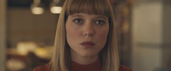 Movie still from “Zoe” (2018), directed by Drake Doremus – A person wearing a red shirt; Close Up shot, Low angle